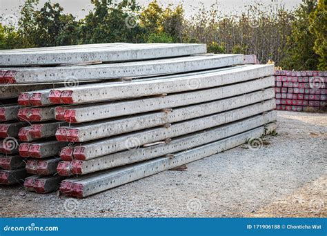 Stacked Concrete Electric Pole On The Ground Stock Photo Image Of