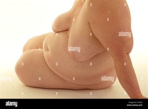 Fat Nude Woman Sitting On The Floor Stock Photo Alamy