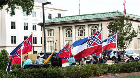 The Mississippi state flag comes down after vote to remove Confederate ...