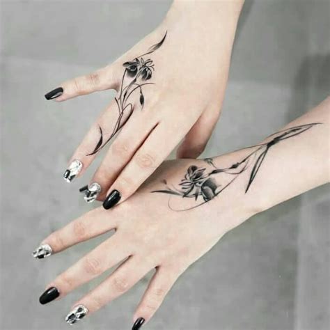 Pin On Tattoo Hand And Finger Tattoos Hand Tattoos For Women Toe