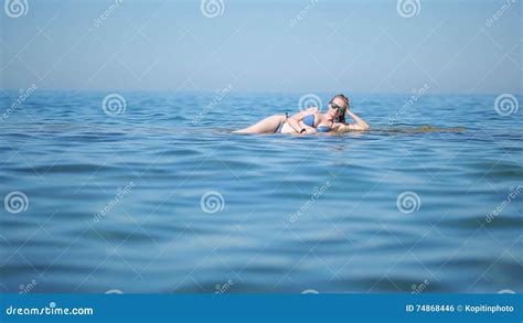 Girl In Blue Bikini Having Fun Lying On The Beach In The Waves Stock Footage Video Of Rest
