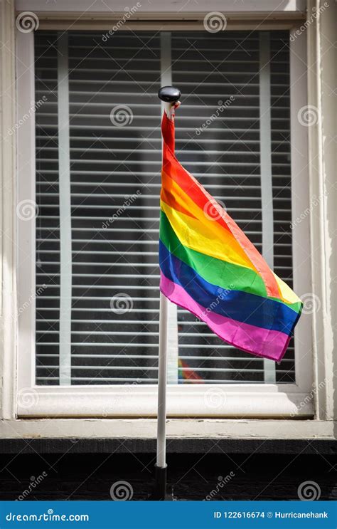 Rainbow Gay Pride Flag On Building Exterior In Amsterdam Stock Photo Image Of Love Design