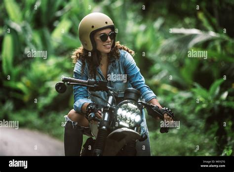 Beautiful Female Biker Driving A Cafe Racer Motorbike Pretty Girl