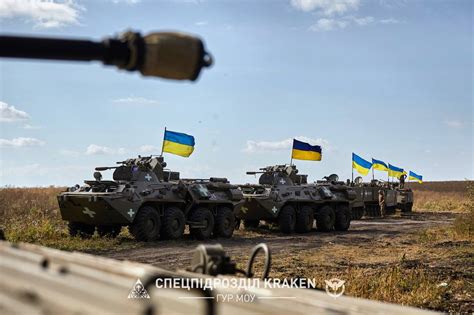 Captured BTR 82 and lend lease M113 APCs of Kraken unit move trough ...