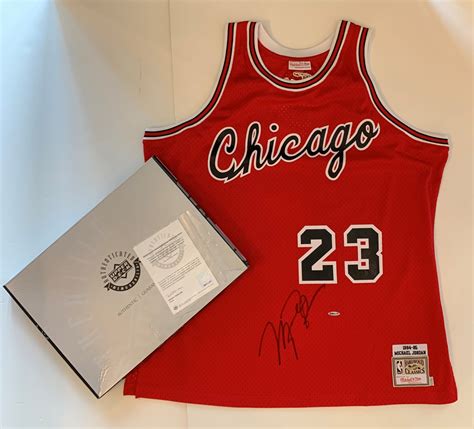 Michael Jordan Autographed Red Chicago Bulls M&N ROOKIE Jersey (front ...