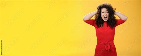 Girl Feeling Pressure Standing Anxious In Panic Holding Hands On Curly Hair Yelling At Camera