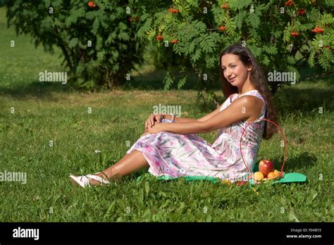 Happy Brunette Girl At Picnic In The Park Stock Photo Alamy