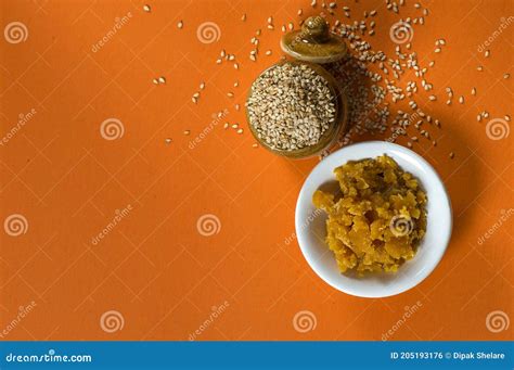 Sesame Seeds In Clay Pot With Jaggery In Bowl Stock Photo Image Of