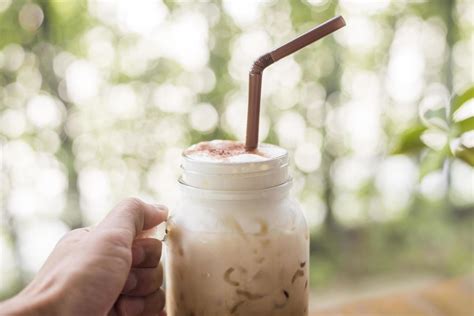 Ice coffee with milk on the wooden table 2597921 Stock Photo at Vecteezy