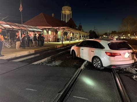 Car stuck on train tracks in Downtown Manassas - Potomac Local News