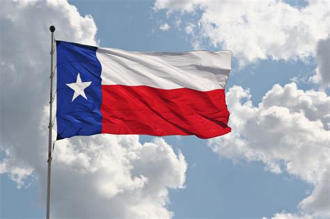 The Texas state flag flying on a beautiful day – AJATC