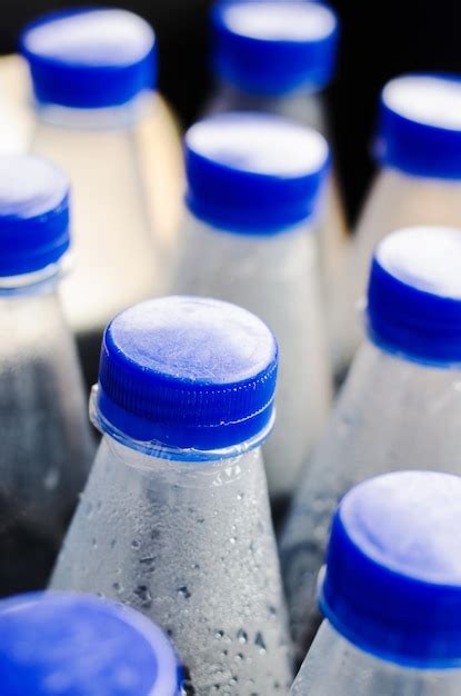 Premium Photo High Angle View Of Bottles On Table