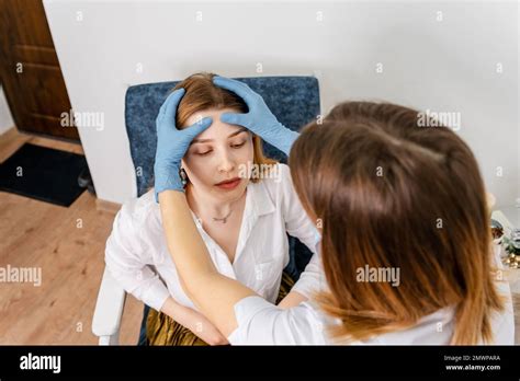 Independent Woman In Consultation With A Doctor In Medicine Cabinet