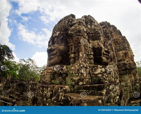 Enigmatic Giant Stone Faces Of Ancient Bayon Temple In Angkor Th Stock