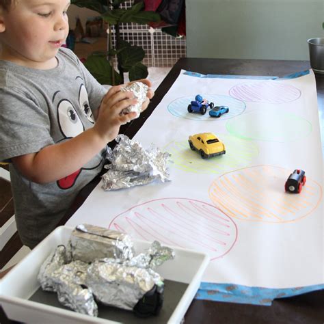 Aluminum Foil Surprise A Fun Toddler Activity Happily Ever Mom