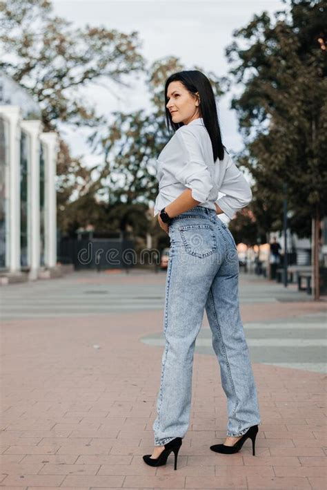 Young Stylish Woman Portrait Woman In Jeans On Street Stock Image