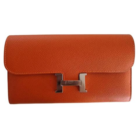 Hermès Long CONSTANCE wallet Orange Leather ref 1006482 Joli Closet