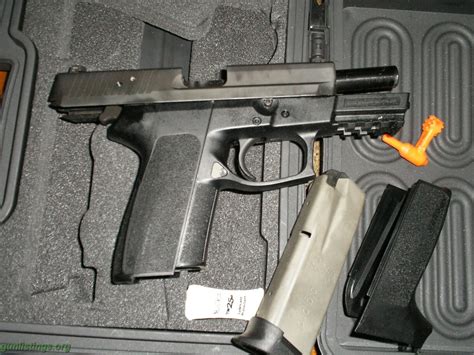 Gunlistings.org - Pistols .40 Sig Sauer P2022 W/rounds NEW!