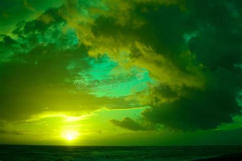 Breathtaking Cloudy Sunset Sky Scenery with Vibrant Green Colors ...