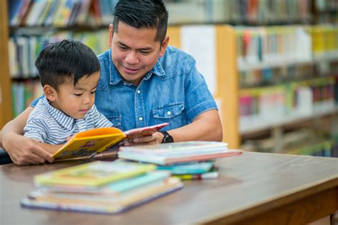 Reading Many Books Stock Photo Download Image Now Library Child
