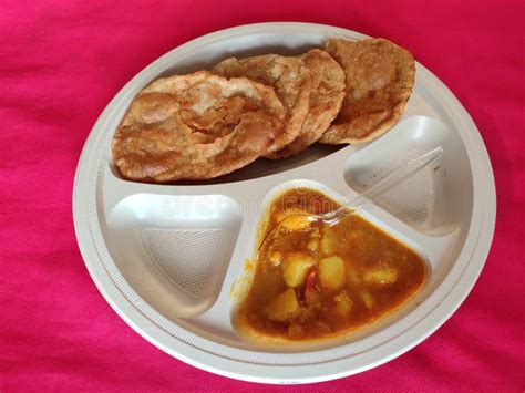 Puri and Potato Curry Aalu Sabji - an Indian Cuisine in Round Plate. Stock Photo - Image of ...