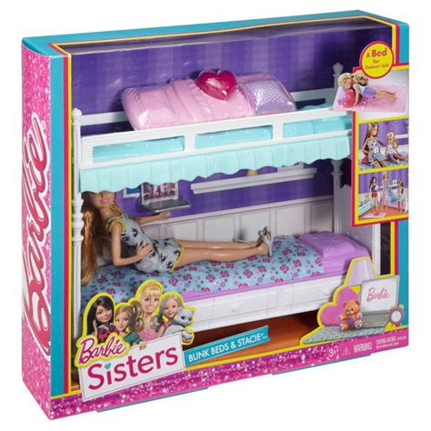 The Barbie Doll Is Laying On Her Bed With Her Stuffed Animal And Other
