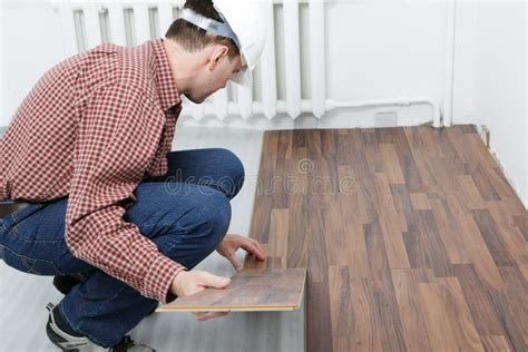 Laminate Flooring Installation Stock Image - Image of home, white: 10448659