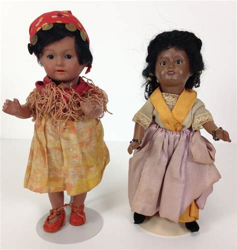 Lot 2 Antique Painted Black Bisque Dolls In Original Costumes Including 8½ Unis 60 With