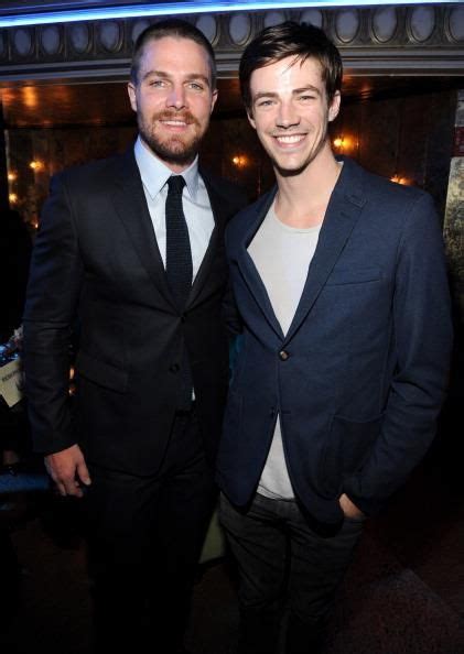 Grant Gustin And Stephen Amell