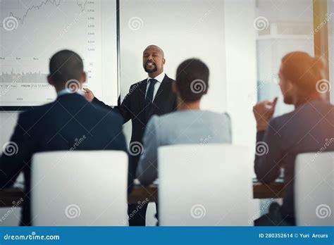 Planning For Another Year Of Success A Mature Businessman Giving A