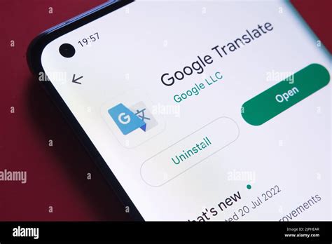 google translate app seen in Google Play Store on the smartphone screen ...
