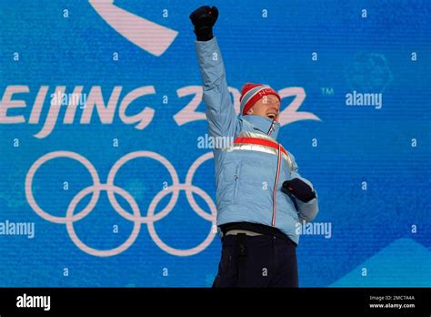 Gold medal winner Norway's Johannes Thingnes Boe celebrates during a ...