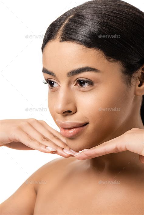 Beautiful Naked African American Girl Touching Face And Looking Away