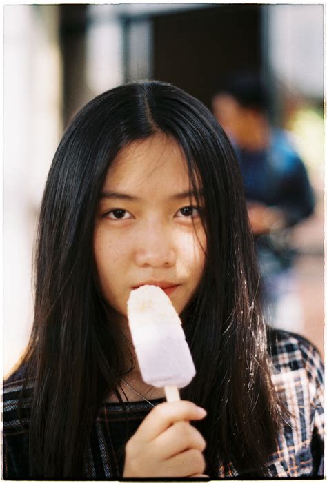 Photo of a Girl Eating Ice Cream · Free Stock Photo