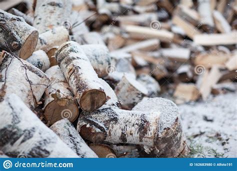 Woodpile With Birch Firewood Snow Covered Firewood Stock Photo Image