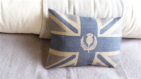 handprinted muted royal blue hessian union jack flag cushion with logo ...