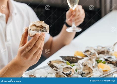 Oyster Man Eating Shellfish Seafood And Mediterranean Cuisine With