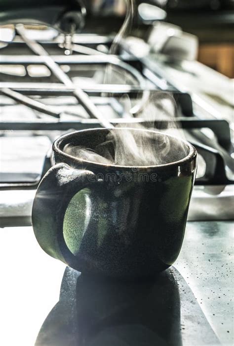 Steaming mug of coffee stock photo. Image of home, steaming - 121599168
