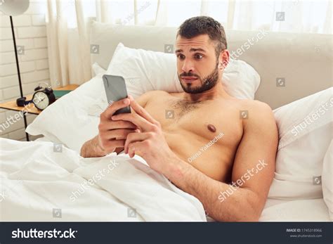 Frustrated Gentleman Naked Torso Lying Bed Stock Photo