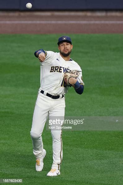 Milwaukee Brewers right fielder Blake Perkins throws the ball during ...