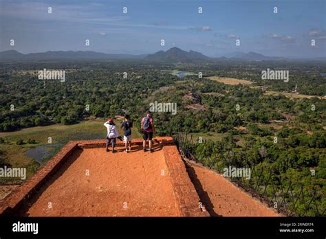 Tourists Admire The View From The Summit Of Sigiriya Rock Fortress In