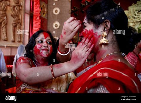 Indian Bengali Women Take Part In A Sindoor Khela During The Durga Puja