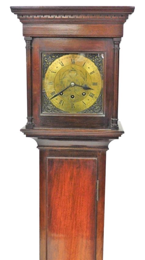 A Mahogany Cased Grandmother Clock The Circular Brass Dial With