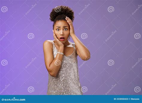 Shocked Afraid Timid Insecure African American Woman In Silver Trendy