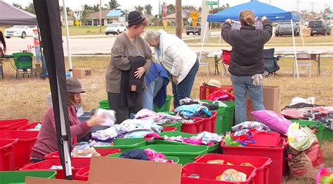 Volunteers Collect Donations Clean Up Debris Left From Tornado