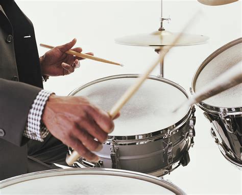 Mature Man Playing Drums Close Up Of By Ryan Mcvay