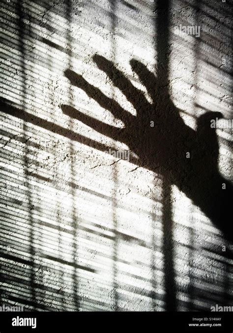 Scary shadow arm hi-res stock photography and images - Alamy