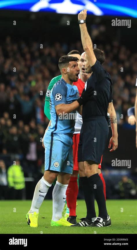 Manchester City S Sergio Aguero Is Given A Yellow Card For Diving By