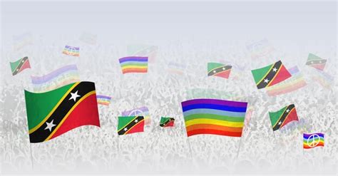 Premium Vector People Waving Peace Flags And Flags Of Saint Kitts And