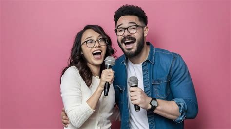 Premium Photo Happy Portrait Of Couple Holding Microphone And Sing A Song